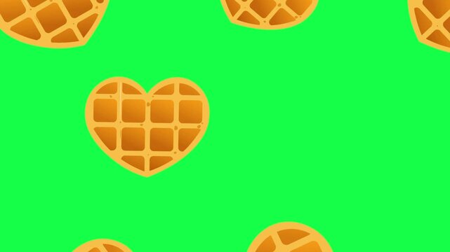 Heart Shaped Belgian Waffles Falling on Green Background &ndash; Sweet Food Video Mockup