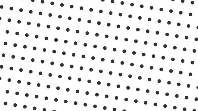 The atomic lattice or surface appears to zoom in and out, appearing as dots. As the viewer zooms in, the camera appears to rotate.