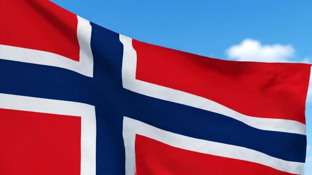 Norwegian flag waving against a clear blue sky with a white cloud in the background
