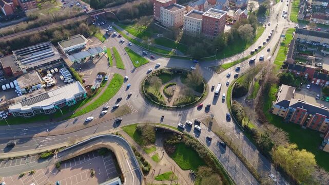 Aerial view of traffic driving around a roundabout in Basildon, Essex, United Kingdom
