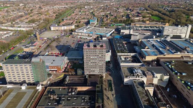 An aerial view of Basildon, UK, featuring buildings and construction sites