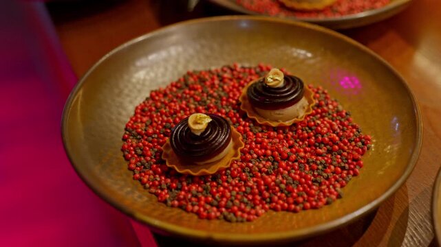A gourmet dinner at a restaurant. Gastronomic food and dishes. Decorations and sophistication of signature dishes from the chef. Food as art. Bright colors of the dishes.