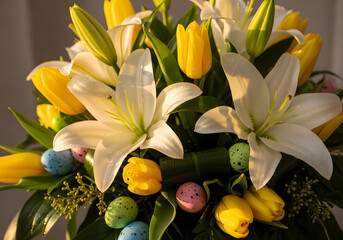 Vibrant easter floral arrangement with lilies and tulips