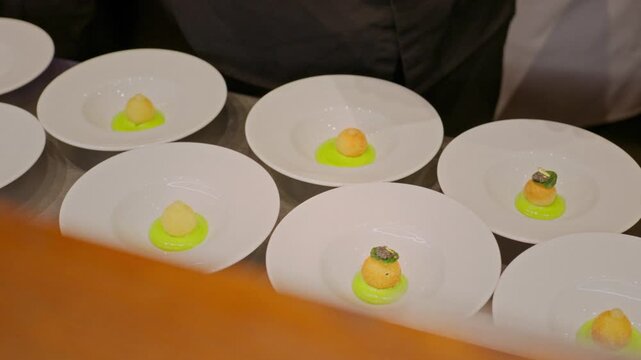 A gourmet dinner at a restaurant. Gastronomic food and dishes. Decorations and sophistication of signature dishes from the chef. Food as art. Bright colors of the dishes.