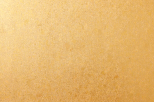 高級感のある金箔を施した金の和紙背景テクスチャ素材　Luxury gold leaf washi paper texture and golden background