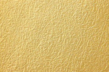 金色の揉み和紙の質感がある和風背景テクスチャ素材　Golden momigami washi paper texture and Japanese style background