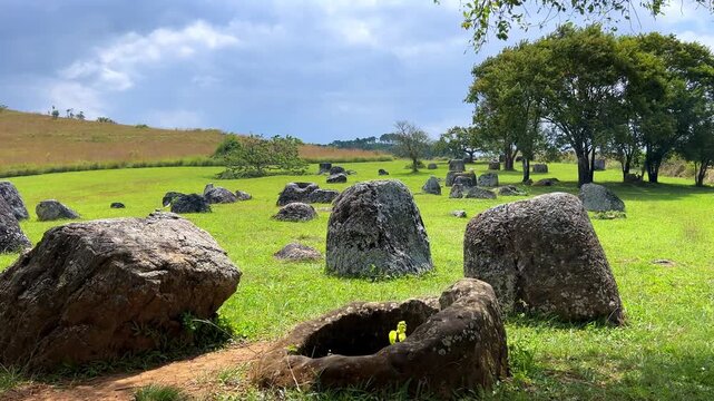 Valley of the Jars, Laos. Phongsavan. Valley of the Jars. The megalithic archaeological landscape consists of thousands of stone jars scattered across the Xiangkhouang Plateau. 4К