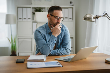 Man thinking about work problem, planning business strategy