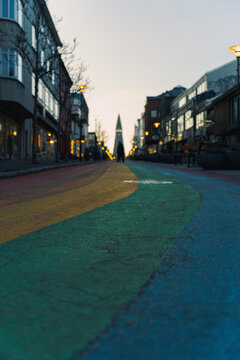 Vertical shot of the curved rainbow pavement in Reykjavik at winter dawn.