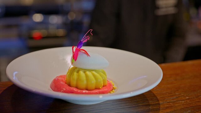 A gourmet dinner at a restaurant. Gastronomic food and dishes. Decorations and sophistication of signature dishes from the chef. Food as art. Bright colors of the dishes.