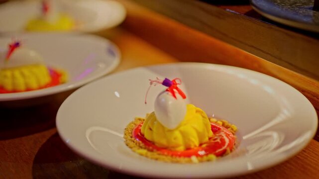 A gourmet dinner at a restaurant. Gastronomic food and dishes. Decorations and sophistication of signature dishes from the chef. Food as art. Bright colors of the dishes.