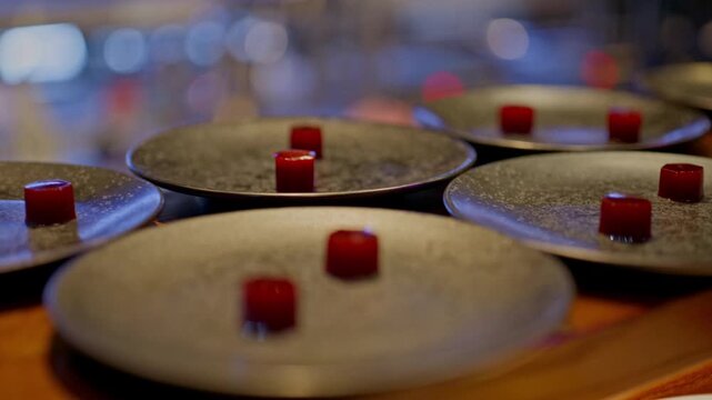 A gourmet dinner at a restaurant. Gastronomic food and dishes. Decorations and sophistication of signature dishes from the chef. Food as art. Bright colors of the dishes.