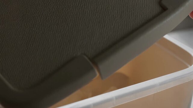 Medium shot of a microtextured selfsanitizing container surface featuring antimicrobial integrated plastic that enhances grip while preventing bacterial growth in everyday use.