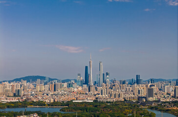 Aerial view Skyline of Guangzhou with modern skyscrapers under clear blue sky