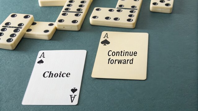 Domino Arrangement and Cards Indicating a Choice to Move Forward