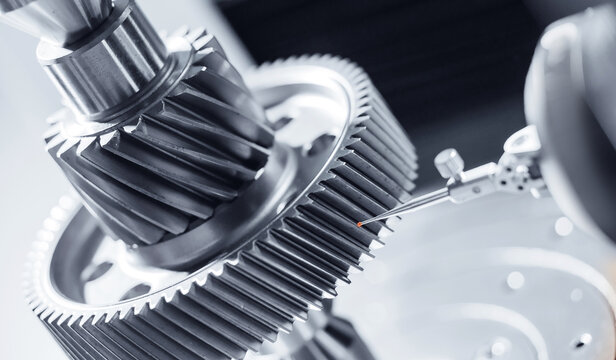 Cnc coordinate measuring machine analyzing metal gear for precision engineering
