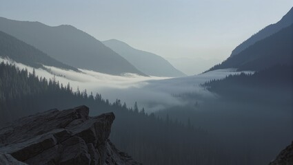 Atmospheric Landscape with Morning Mist Over Mountain Valley Wilderness Scene © dionlaloc