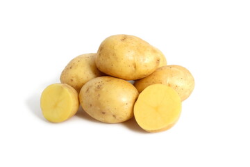 On a white background lies a pile of freshly harvested potatoes.
