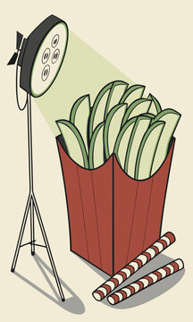 French Fries in a Box with a Spotlight and Candy Canes.