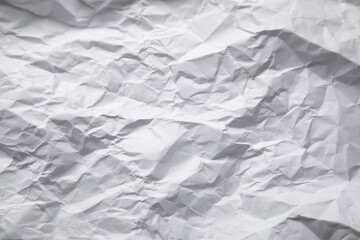 Obraz premium Crumpled paper background. White paper texture