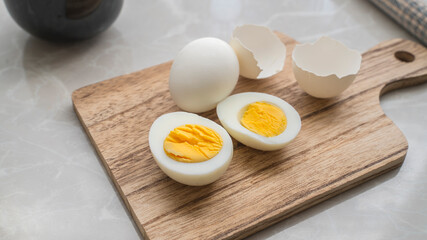 Boiled eggs on a cutting board. 