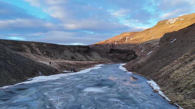 Drohnenflug rund um  den Porufoss Wasserfall auf Island der gerade sch&ouml;n vereist ist	