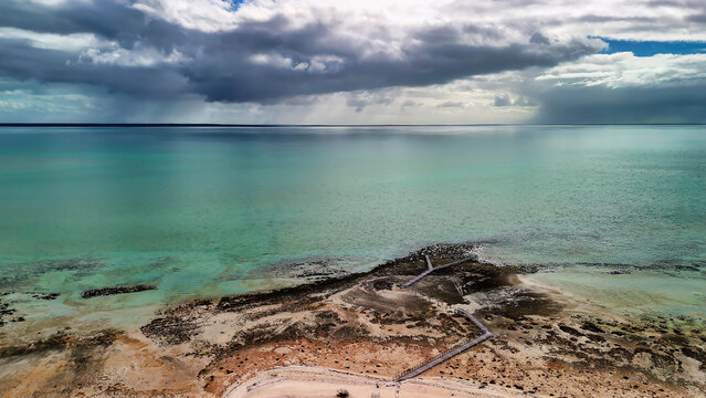 Scenic aerial panorama of Hamelin Pool WA highlighting coastline and shallow marine flats