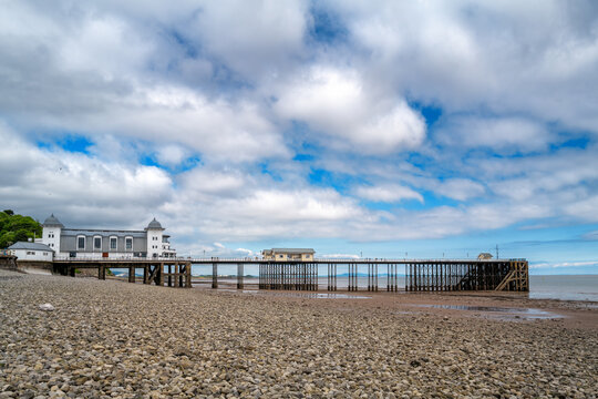 The beach and Victorian Pier at Penarth, Cardiff, Wales. Opened in 1898 and situated on the Bristol Channel, the town is a popular holiday destination.