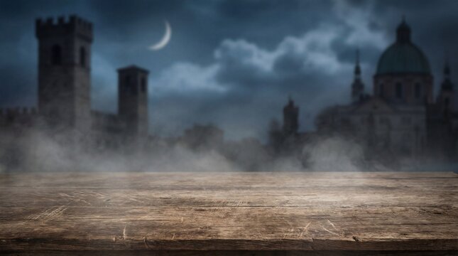 Empty rustic wooden table with a spooky medieval city background at night.