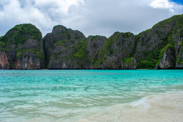 Fototapeta premium View of famous Maya Bay, Thailand. One of the most popular beach in the world. Ko Phi Phi islands. Beach without people.
