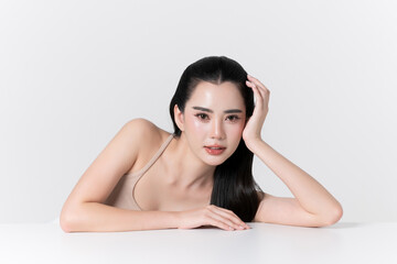 Fototapeta premium Beautiful portrait of young asian woman with healthy facial and body skin, healthy hair, care teeth and glowing natural makeup for advertise skincare product, wellness, self care and cosmetic concept.