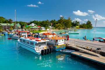 View of the marina of boats in beautiful sunny day, La Passe, La Digue Island, Seychelles © proslgn
