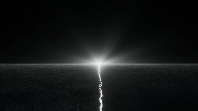 Creation of light in the darkness. Biblical genesis concept of the first day. Cinematic monochrome shot of light appearing on the horizon. Spiritual and religious background