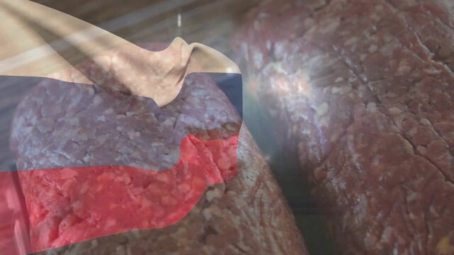 Raw ground meat filling tray as translucent profile drifting and camera zooming to reveal texture