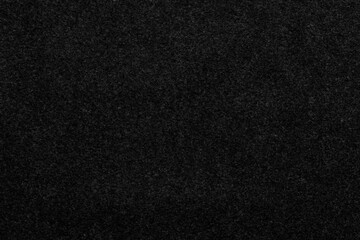 Fototapeta premium Dark textured surface suitable for various artistic and design applications