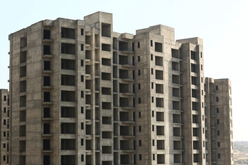 Fototapeta premium Unfinished Concrete High-Rise Building Structure