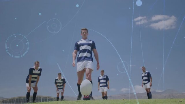 Rugby kicker walking to ball on tee, planting foot while settling to kick, blue overlays growing