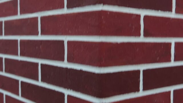 Corner of a new brick house. A red brick house.