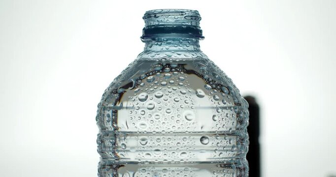Water bottle with condensation closeup.