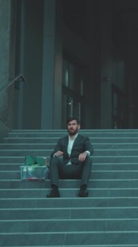 Unemployed executive reflects on career collapse, Desperate businessman contemplates uncertain future amid setbacks