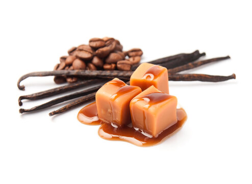 Caramel candy with vanilla pods and coffee bean