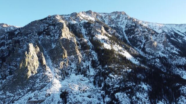 Baeartooth Mountains in winter sunset drone 