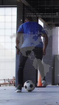 Vertical video: Soccer player tapping ball, doing sole rolls to train touch as map overlay moving