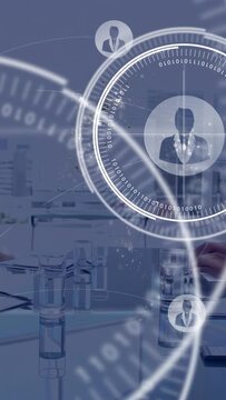 Vertical video: Hands writing notes initiating corporate HUD, orbiting icons mapping staff network