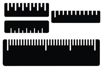 Black rulers in different sizes on white background