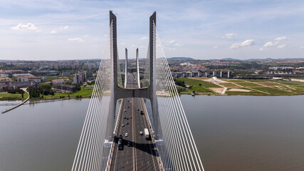Fototapeta premium High angle view of cable stayed Vasco da Gama bridge over Tagus river in Lisbon city