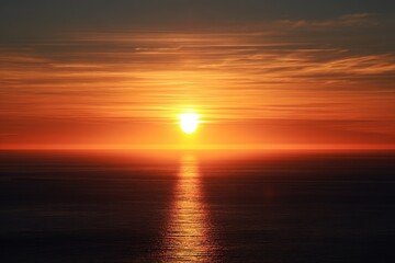 Golden Sunset Over Calm Ocean Waters with Reflective Sunlight.