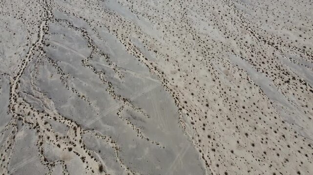 Train in desolate desert landscape 