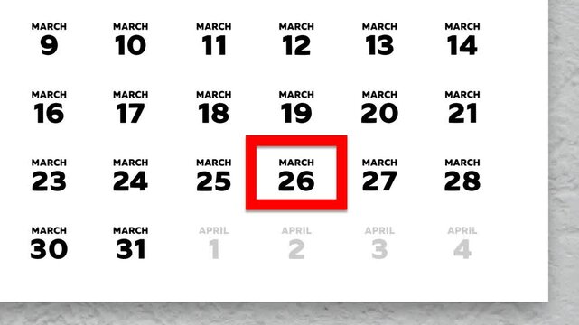 The date March 26th marked with a red cursor on the wall calendar 2026