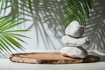 Fototapeta premium Wooden podium with leaves and shadows. Realistic wood platform for product presentation. Minimal nature scene with pedestal mockup. cosmetic display or award ceremony